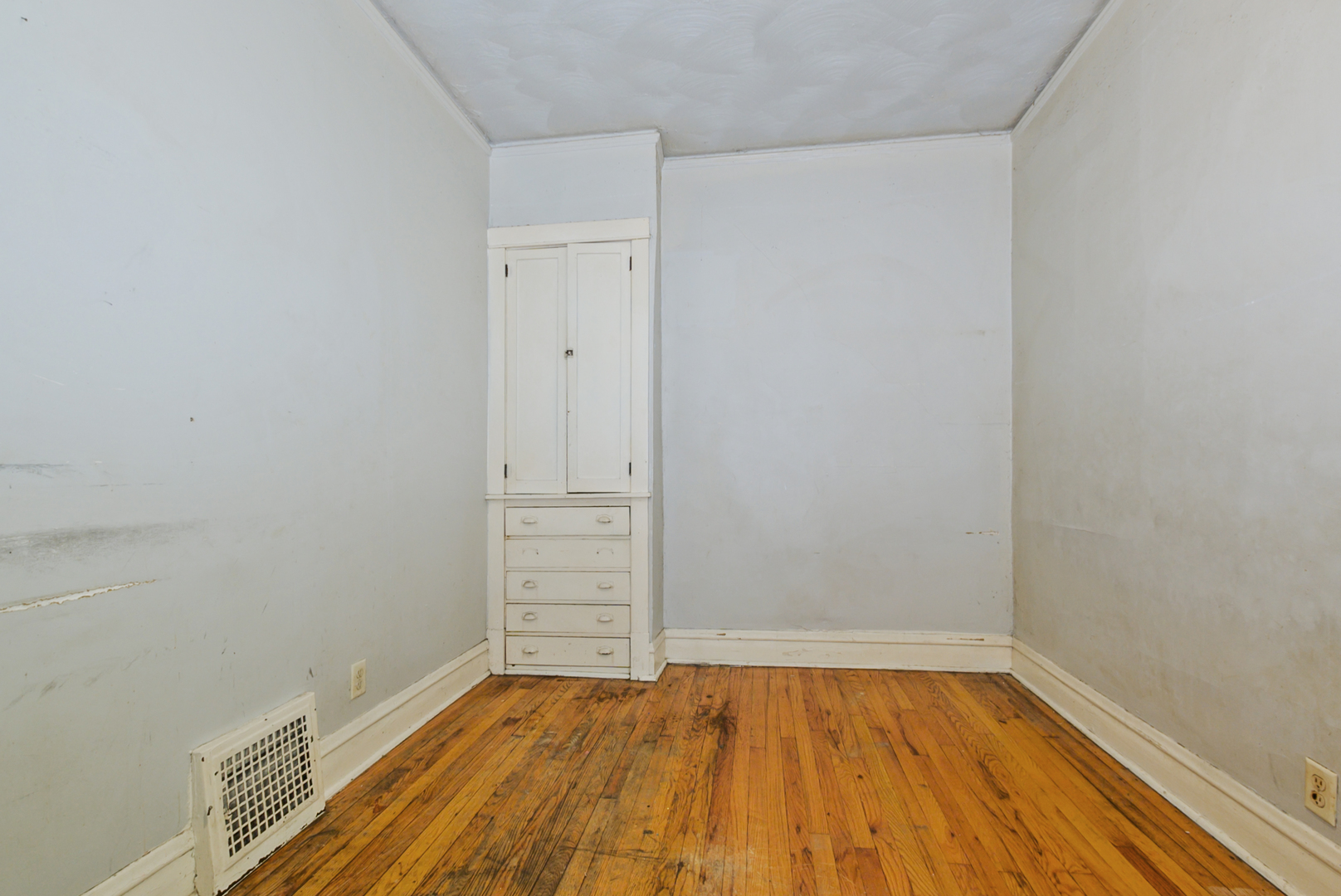 10320 South Indiana Avenue Chicago, IL 60628 - Photo 10 of 24 wooden floor in a room