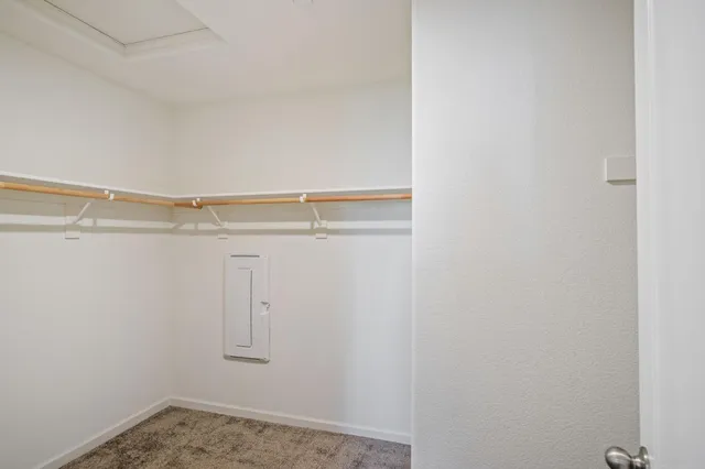 a view of a room with racks on the wall