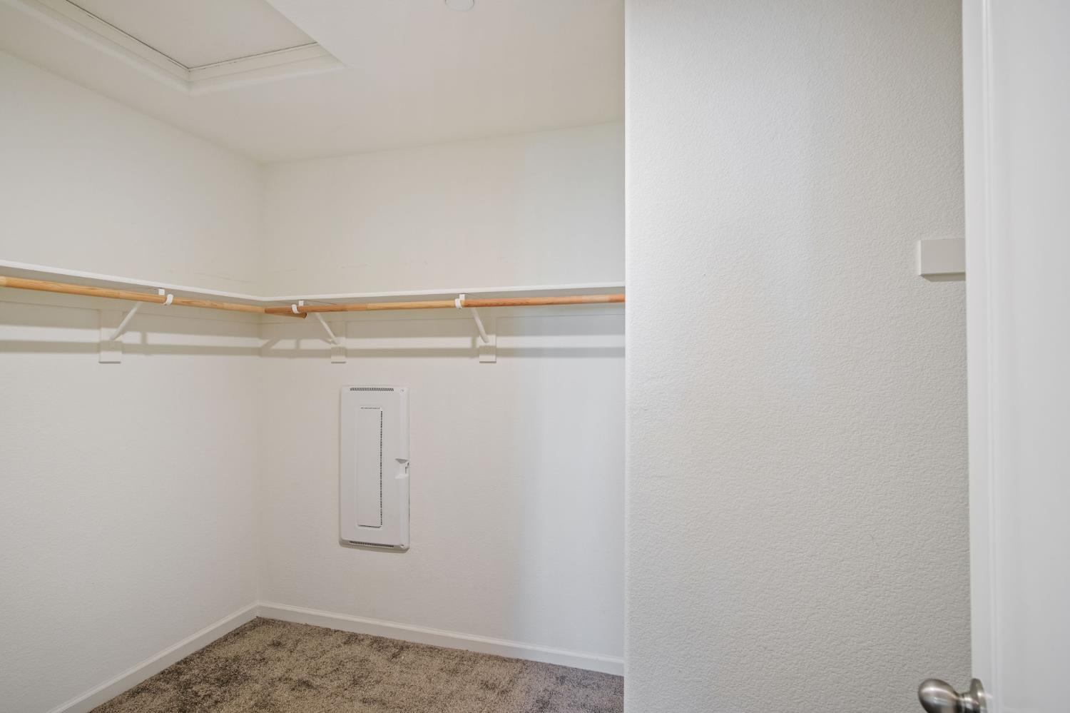 767 Day Break Way Ceres, CA 95307 - Photo 20 of 28 a view of a room with racks on the wall