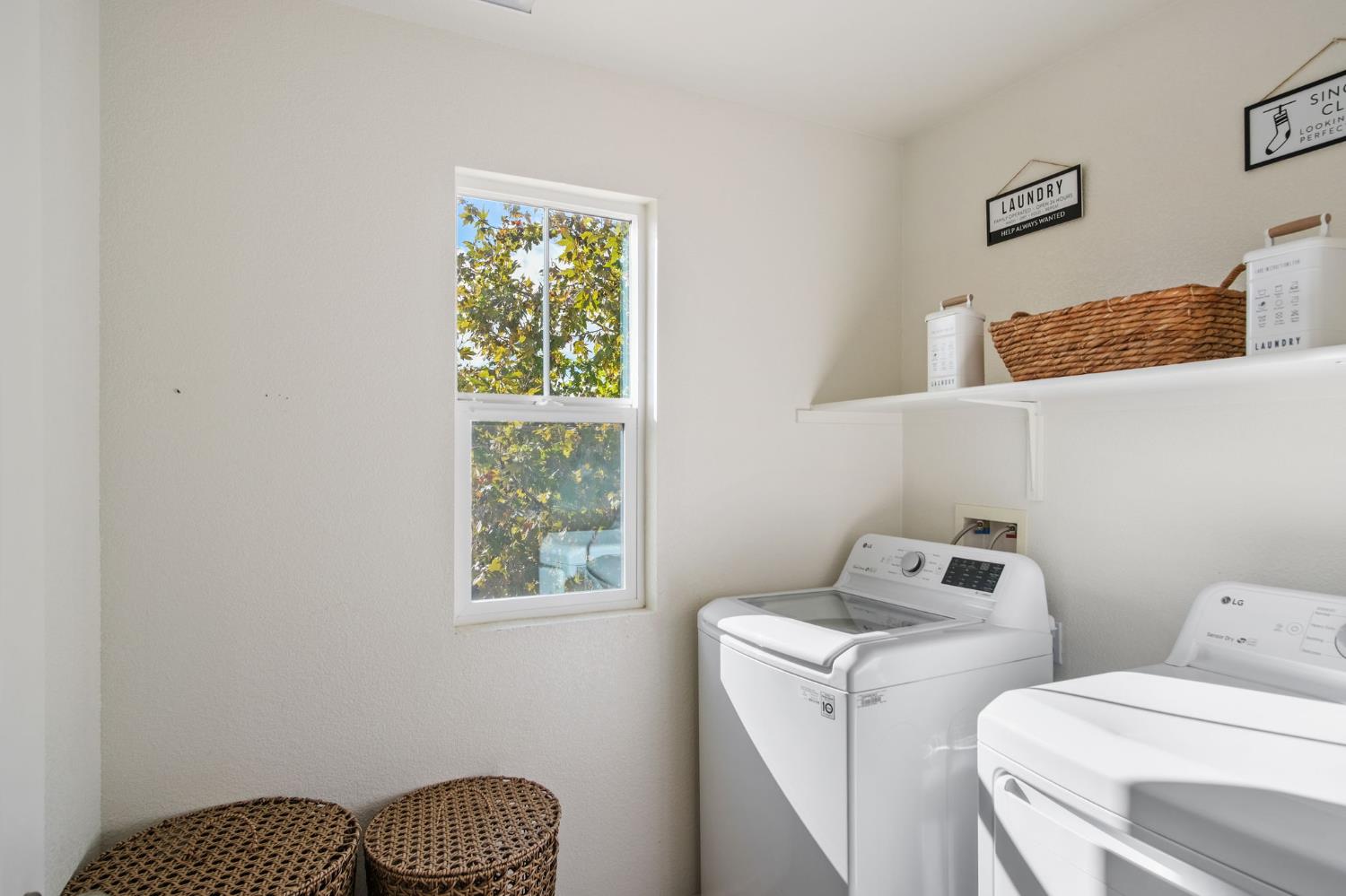 767 Day Break Way Ceres, CA 95307 - Photo 23 of 28 a view of storage and utility room with washer and dryer