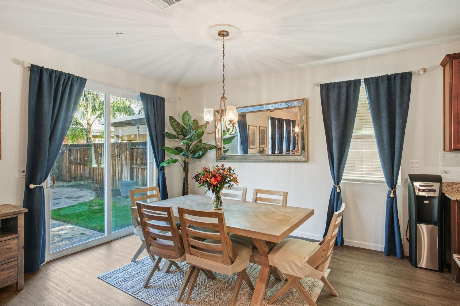 767 Day Break Way Ceres, CA 95307 - Photo 6 of 28 a dining room with furniture window and wooden floor