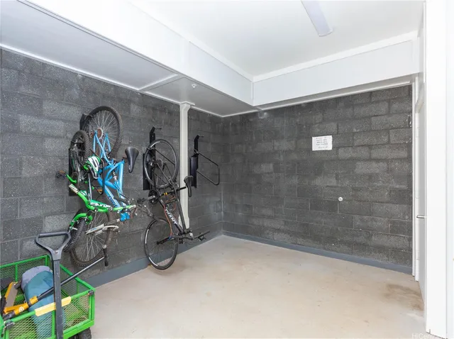 a front view of a house with a garden and plants