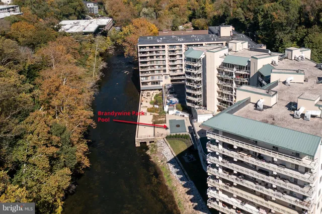 a view of yard with swimming pool and outdoor seating