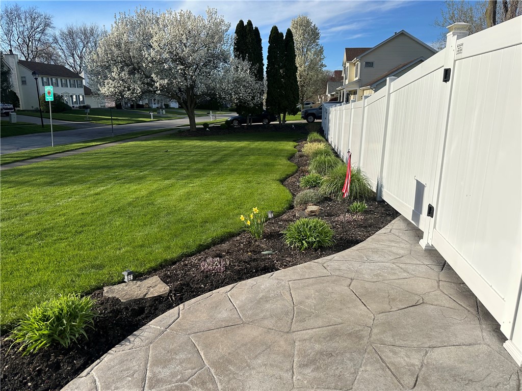 120 Donna Road Gates, NY 14606 - Photo 32 of 47 Stamped Concrete sidewalk (side yard)