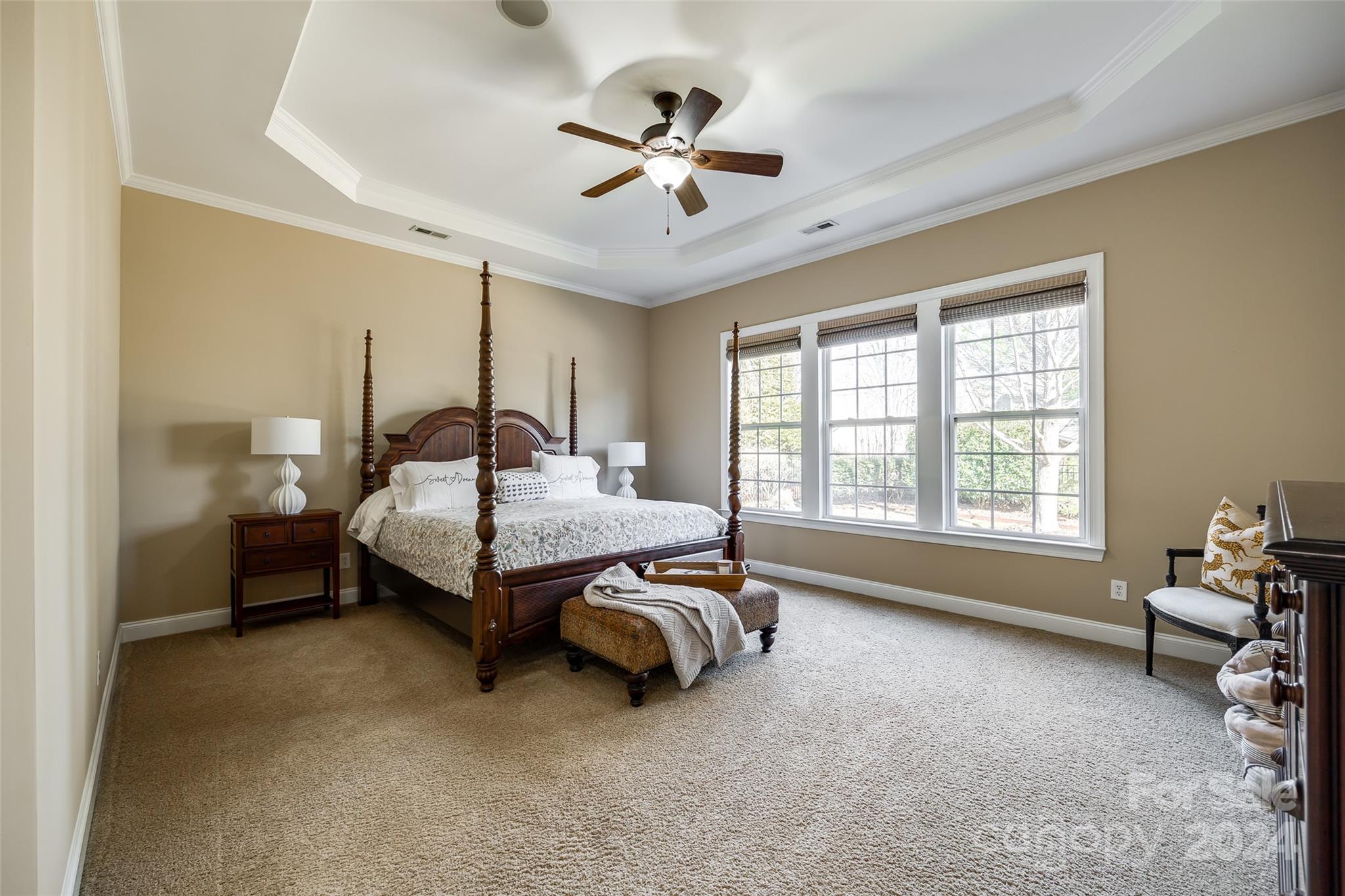 674 Quicksilver Trail Fort Mill, SC 29708 - Photo 15 of 45 a spacious bedroom with a bed and ceiling fan