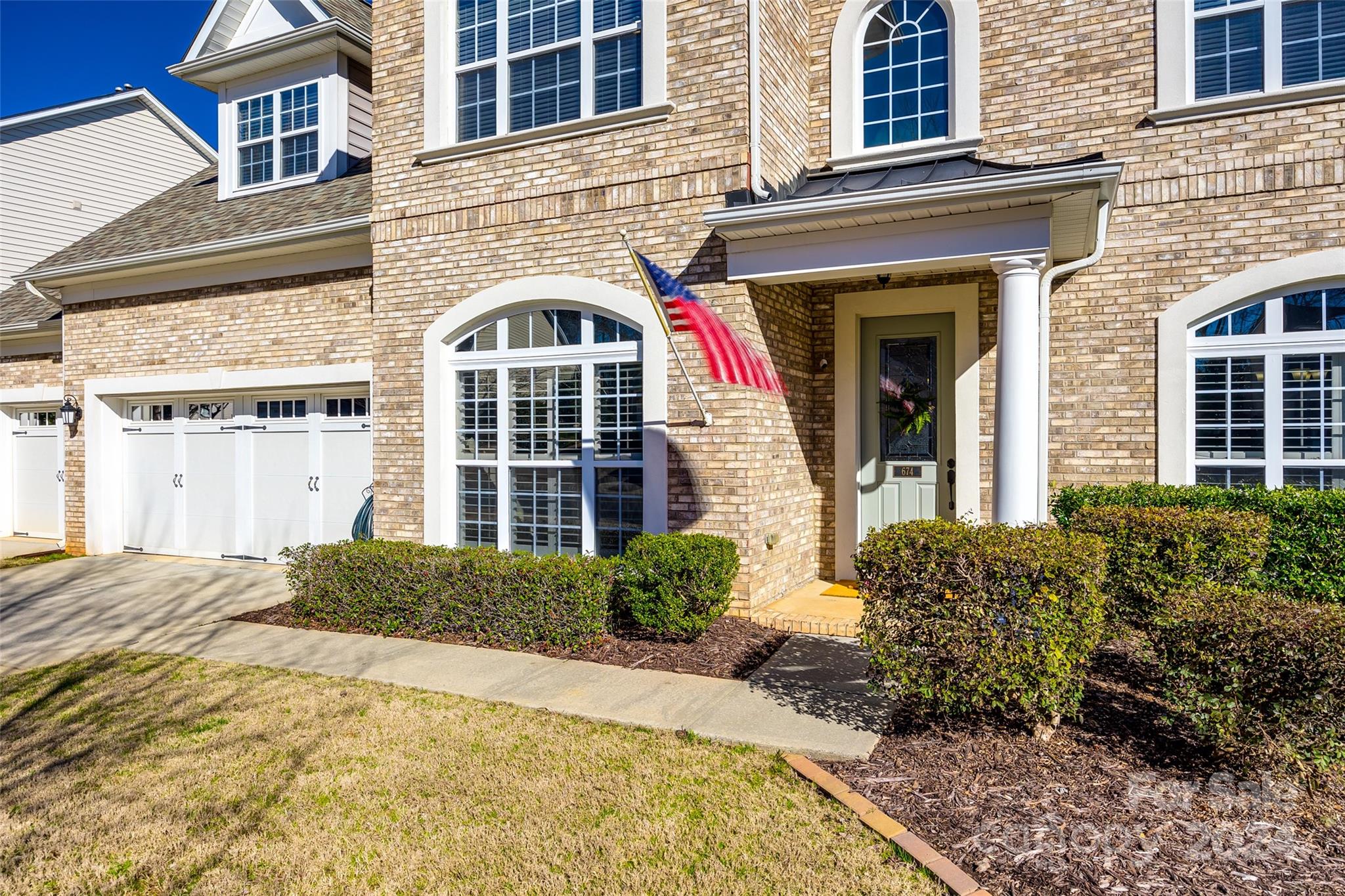 674 Quicksilver Trail Fort Mill, SC 29708 - Photo 2 of 45 a front view of a house with a yard