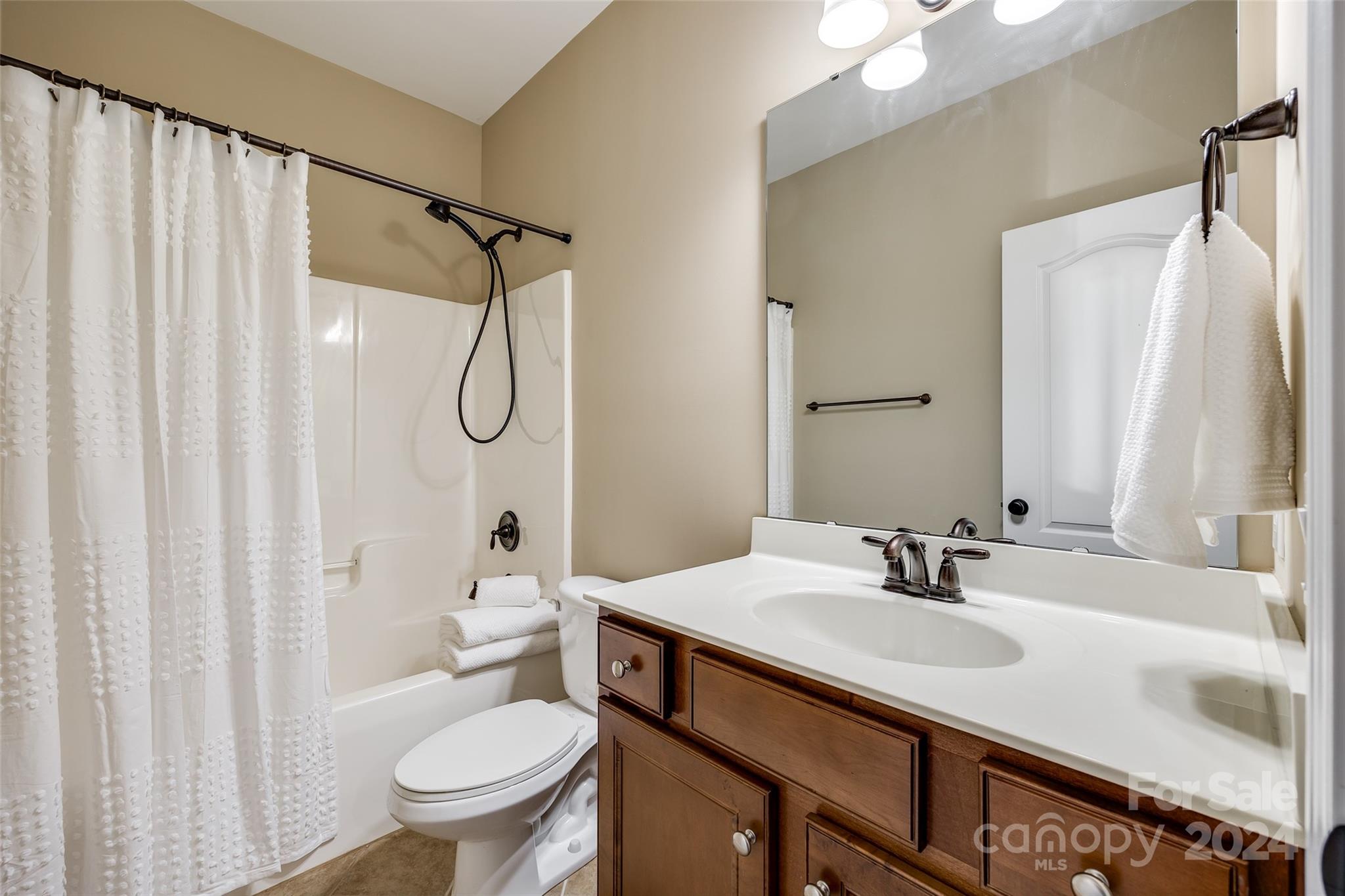 674 Quicksilver Trail Fort Mill, SC 29708 - Photo 24 of 45 a bathroom with a sink toilet and shower