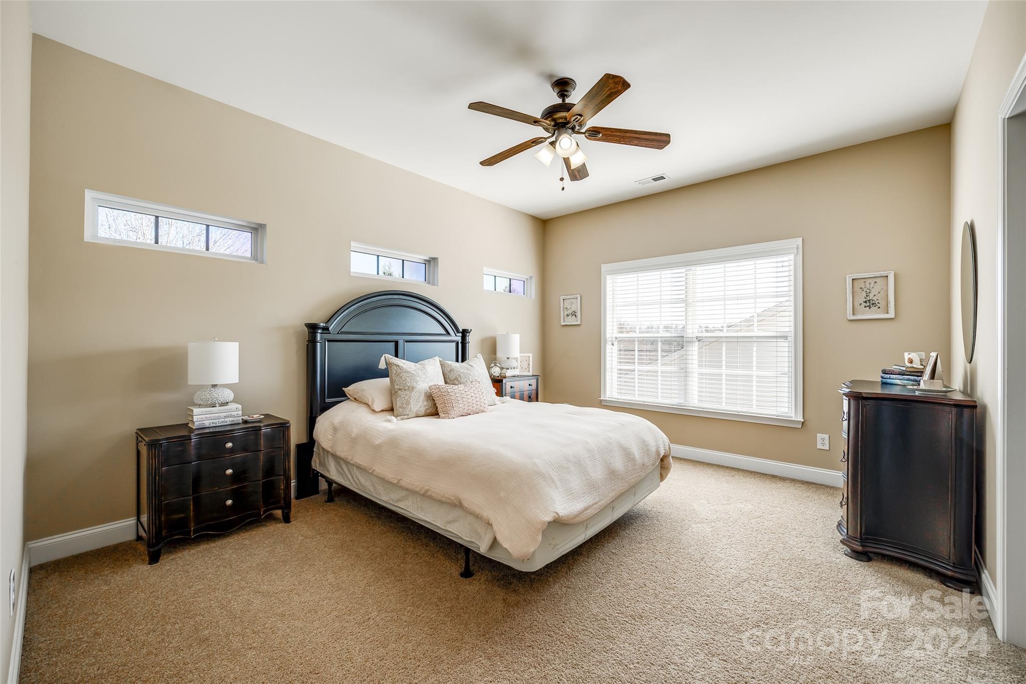674 Quicksilver Trail Fort Mill, SC 29708 - Photo 27 of 45 a bedroom with a bed and a window