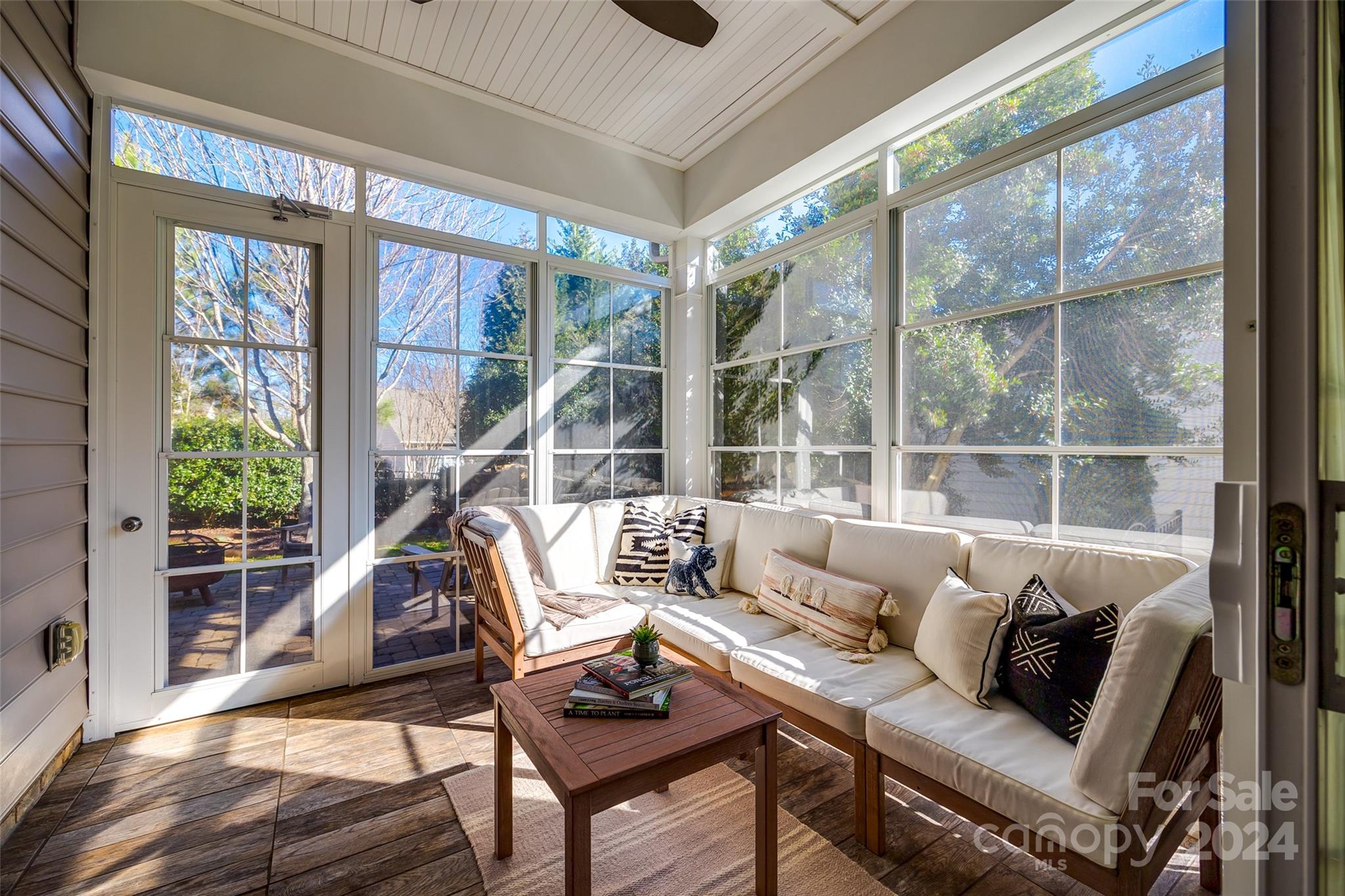 674 Quicksilver Trail Fort Mill, SC 29708 - Photo 29 of 45 a living room with furniture and floor to ceiling windows