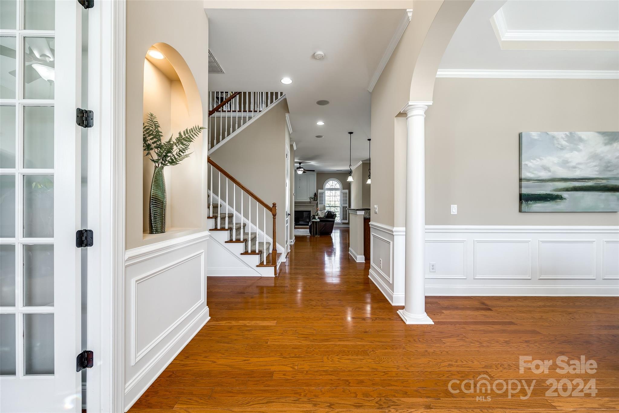 674 Quicksilver Trail Fort Mill, SC 29708 - Photo 3 of 45 a view of entryway and hall with wooden floor
