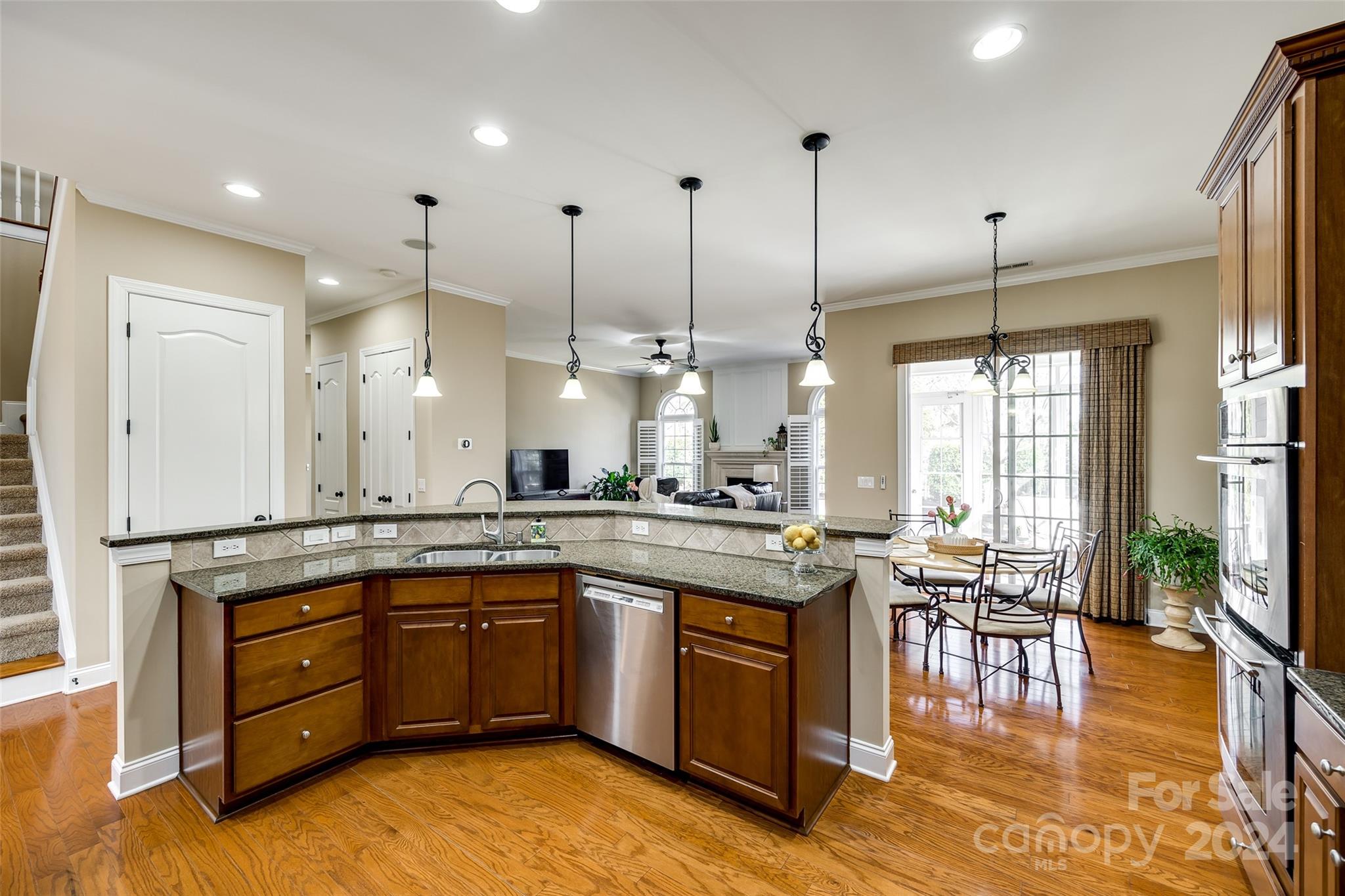 674 Quicksilver Trail Fort Mill, SC 29708 - Photo 10 of 45 a kitchen with a sink stove and cabinets