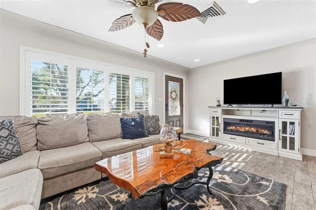 a kitchen with stainless steel appliances granite countertop a refrigerator stove and oven