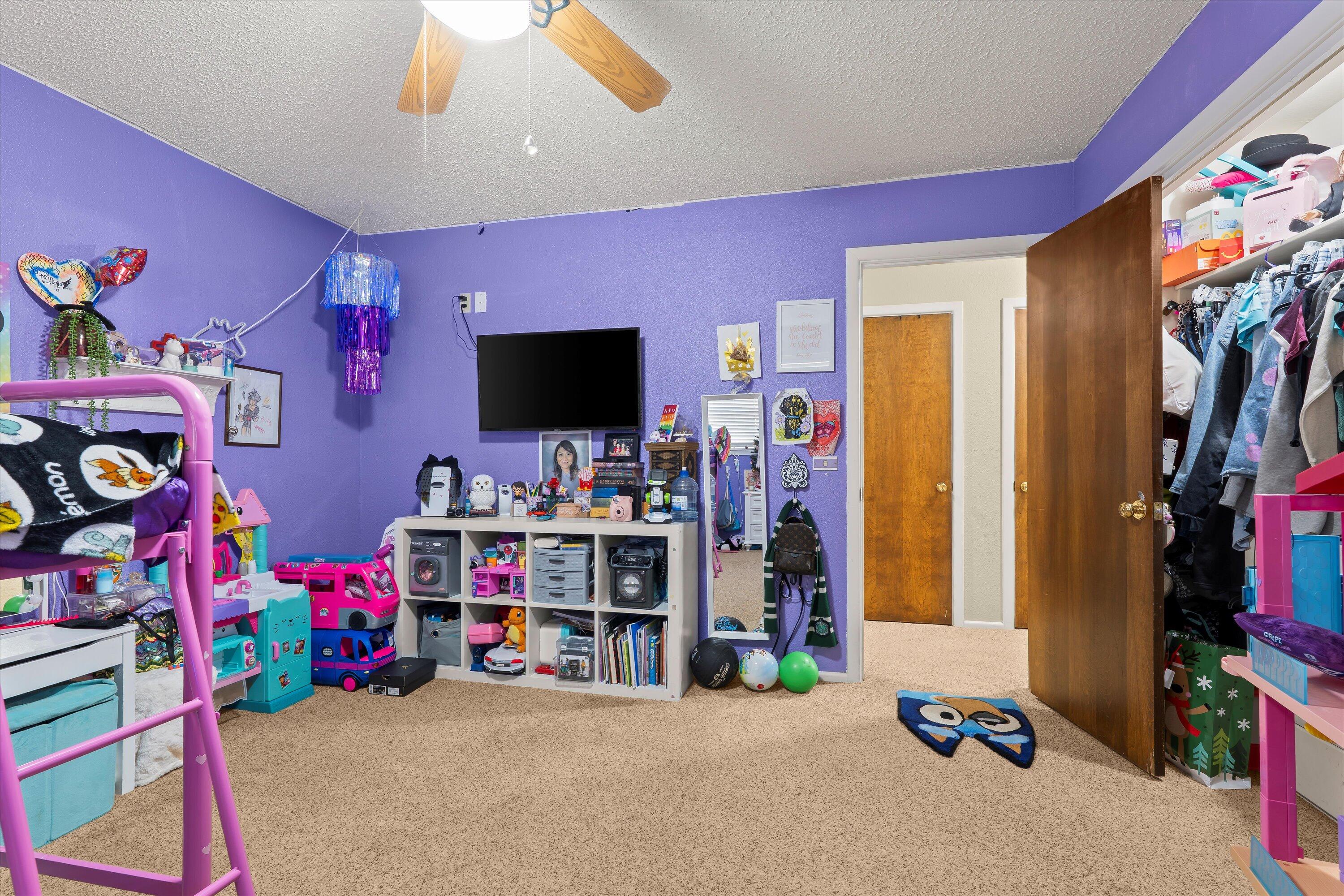 403 Crescent Drive Littlefield, TX 79339 - Photo 21 of 35 a view of a room with toys and a flat screen tv