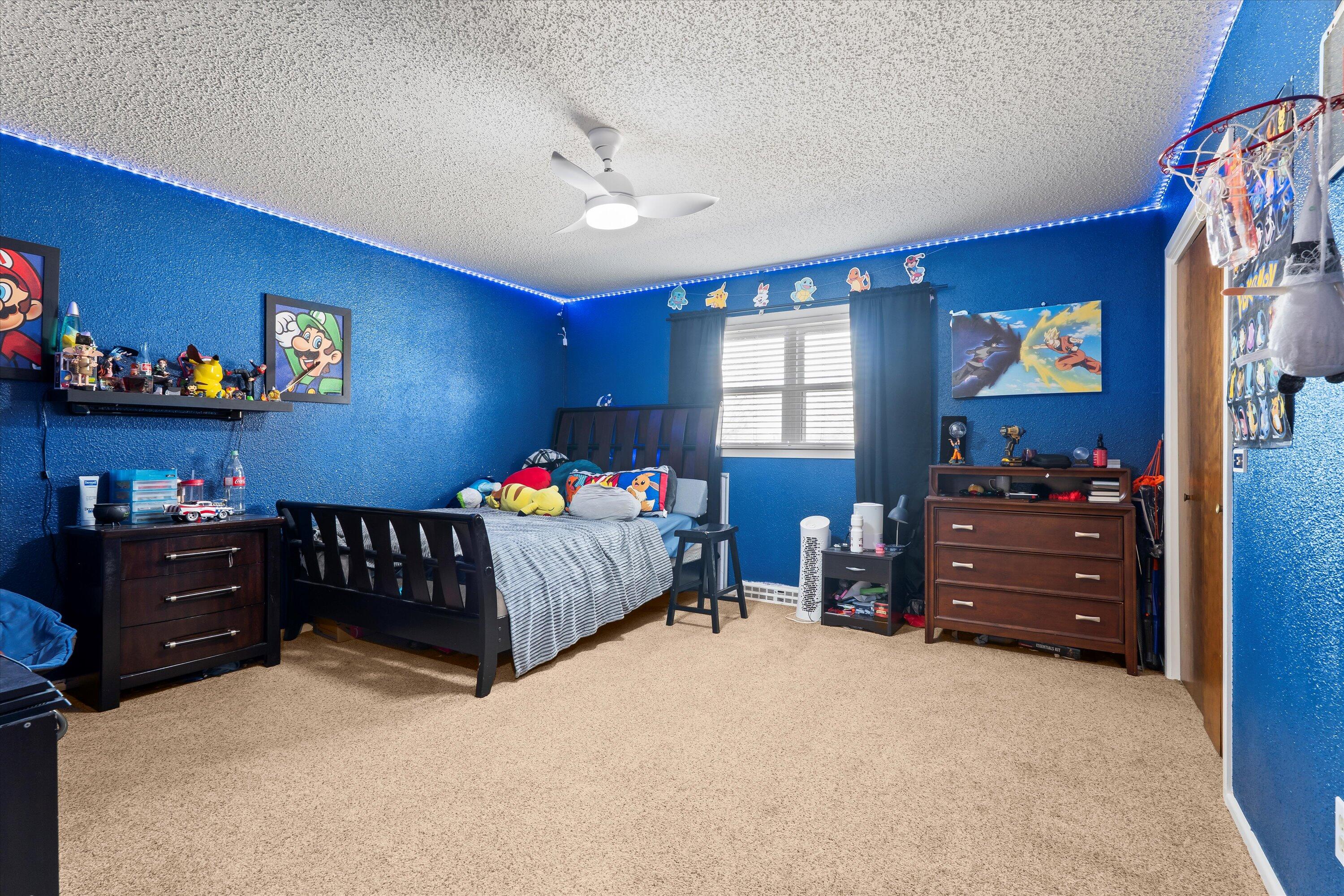 403 Crescent Drive Littlefield, TX 79339 - Photo 22 of 35 a bedroom with a bed and a dresser
