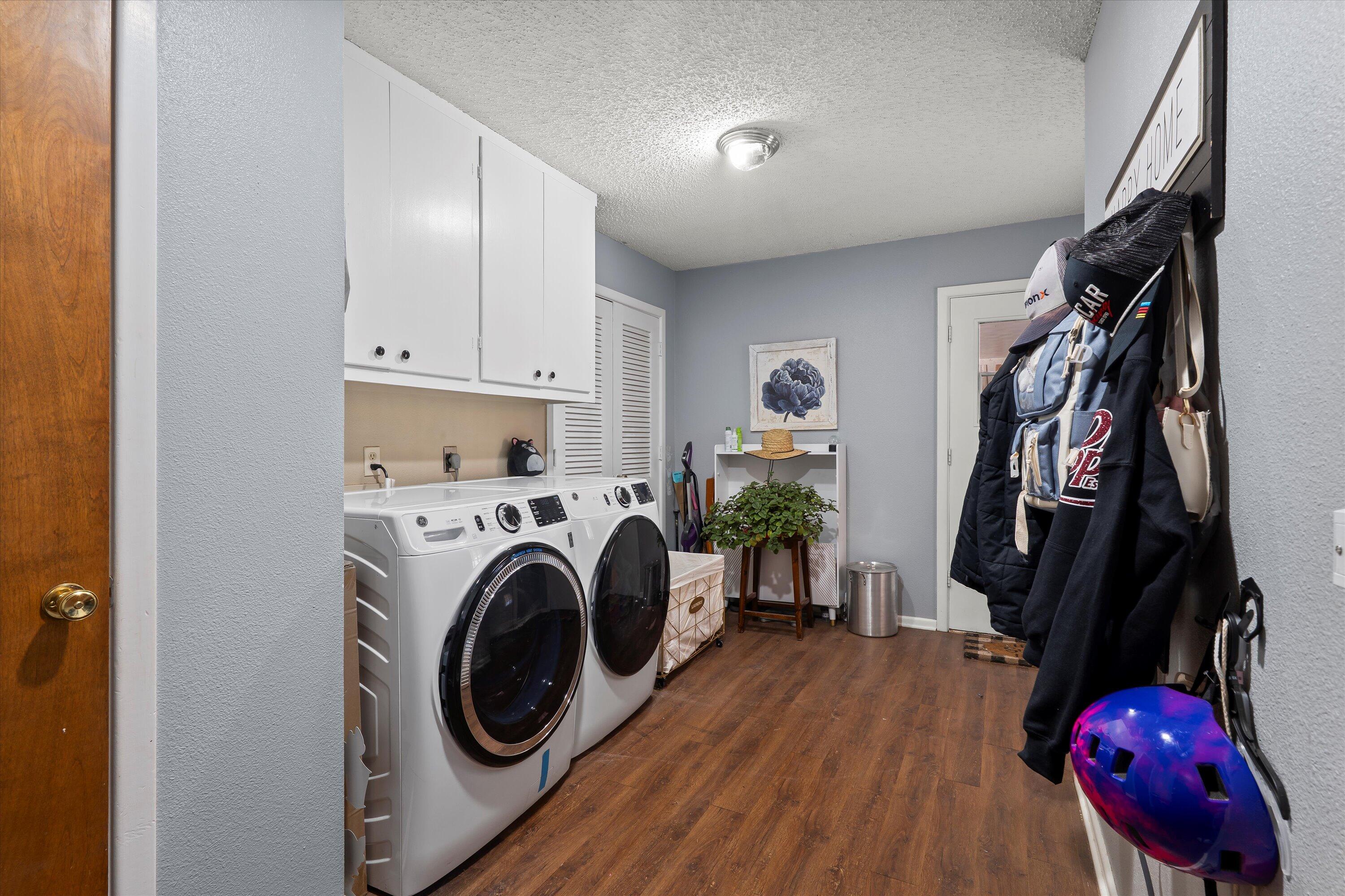 403 Crescent Drive Littlefield, TX 79339 - Photo 28 of 35 a view of walk in closet with clothes and shoes