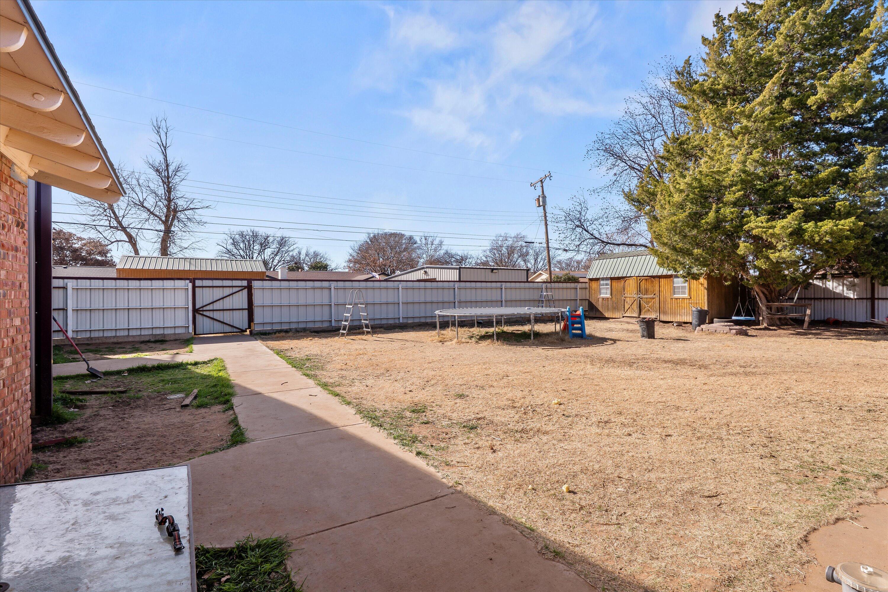 403 Crescent Drive Littlefield, TX 79339 - Photo 30 of 35 a view of a terrace with a barbeque