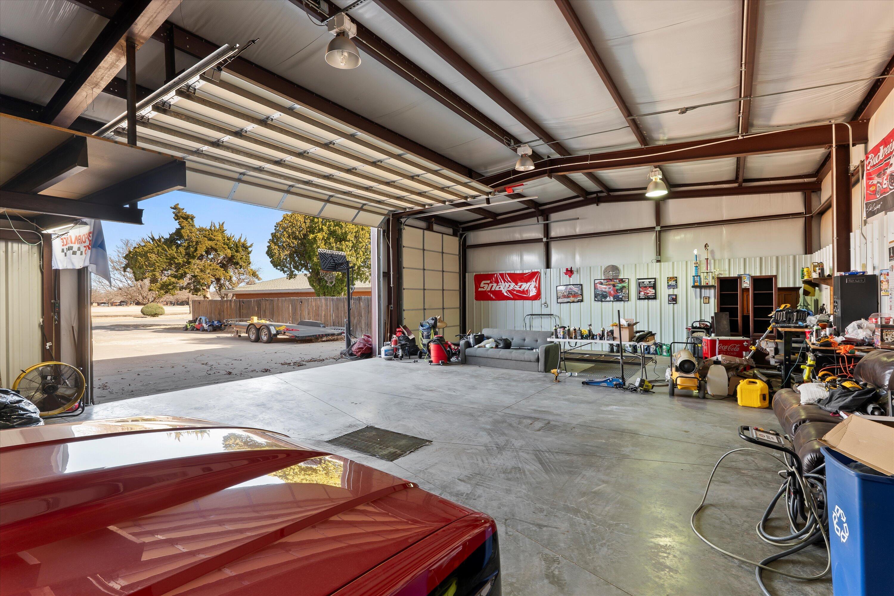 403 Crescent Drive Littlefield, TX 79339 - Photo 35 of 35 a view of parking garage with cars