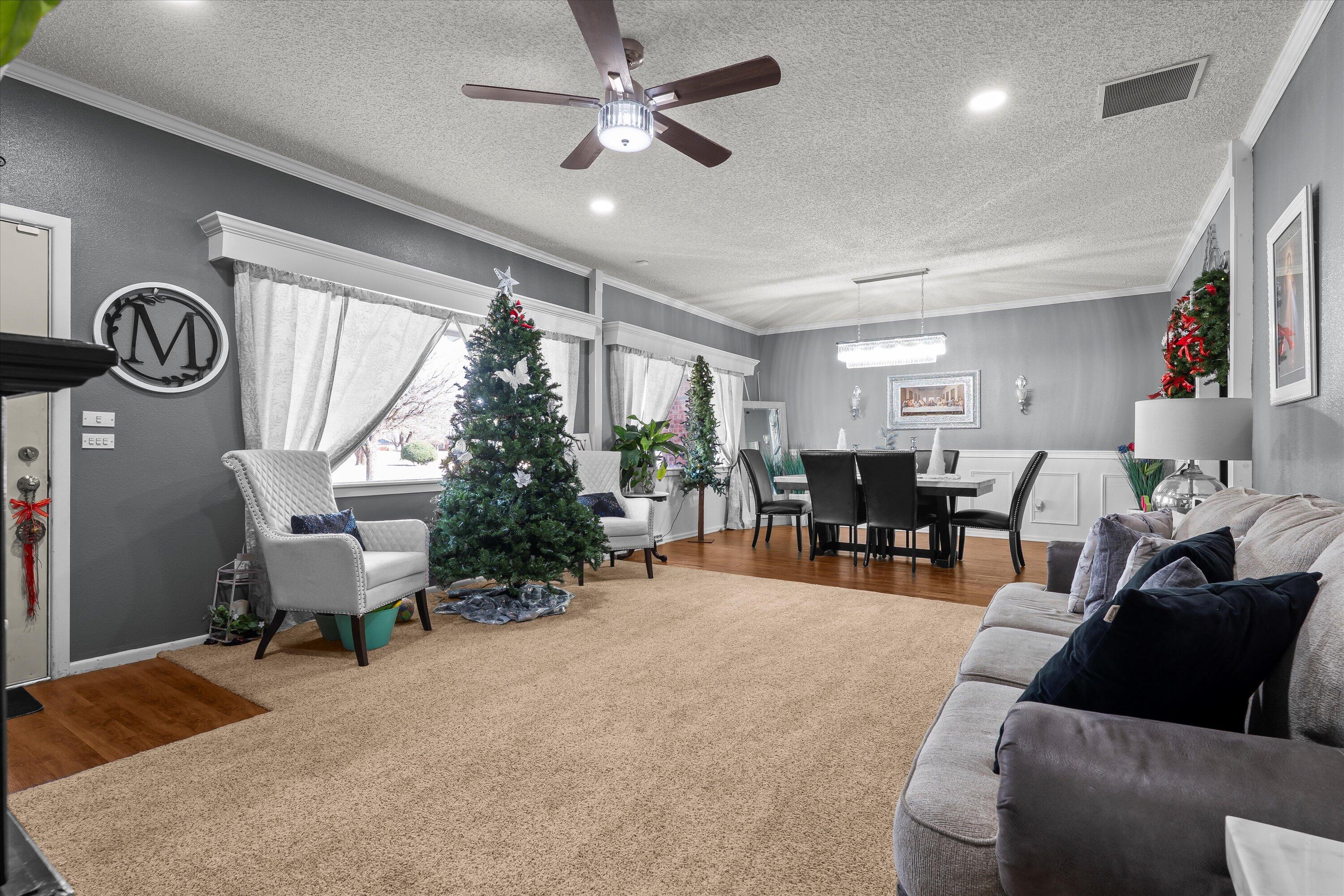 403 Crescent Drive Littlefield, TX 79339 - Photo 6 of 35 a living room with furniture and wooden floor