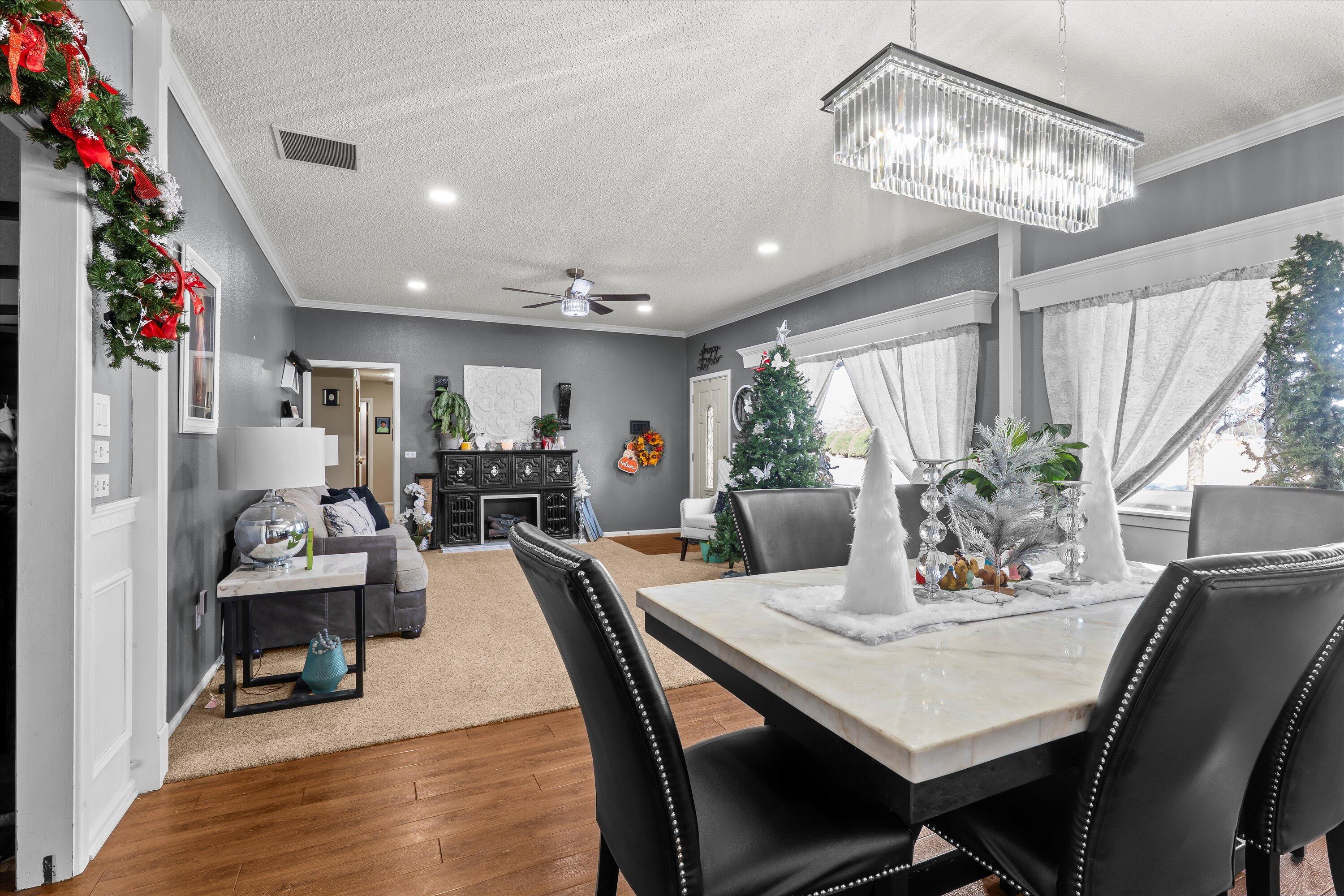 403 Crescent Drive Littlefield, TX 79339 - Photo 7 of 35 a view of a dining room with furniture window and wooden floor