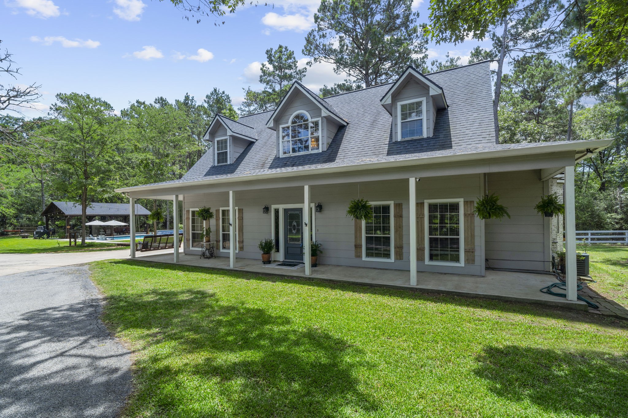 Welcome to 19610 Timber Ridge Drive. This charming home has a wrap around porch and serves as a peaceful retreat you'll enjoy coming home to every day.