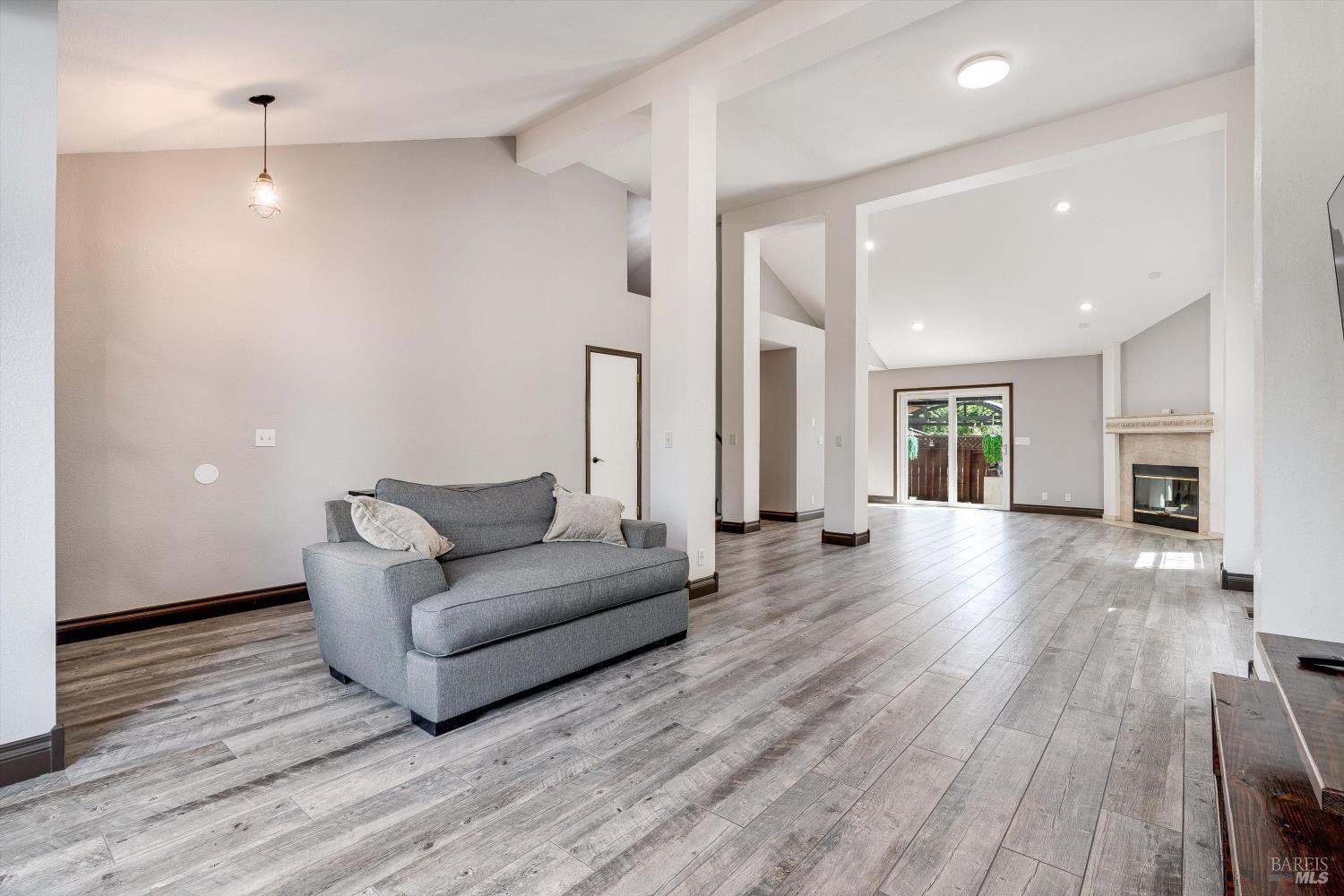 187 Wikiup Meadows Drive Santa Rosa, CA 95403 - Photo 11 of 66 a living room with furniture and a wooden floor