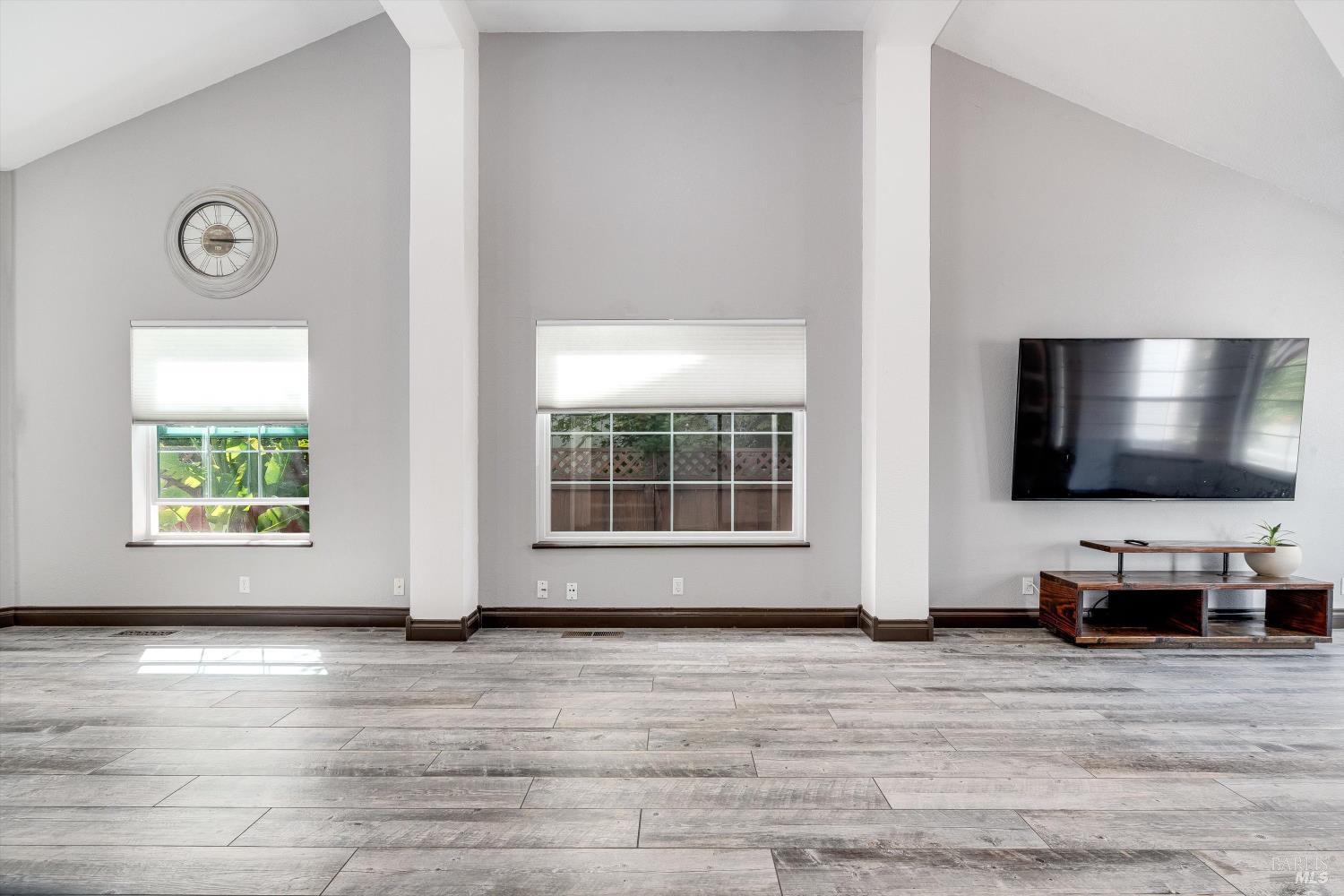 187 Wikiup Meadows Drive Santa Rosa, CA 95403 - Photo 14 of 66 a living room with furniture and a flat screen tv