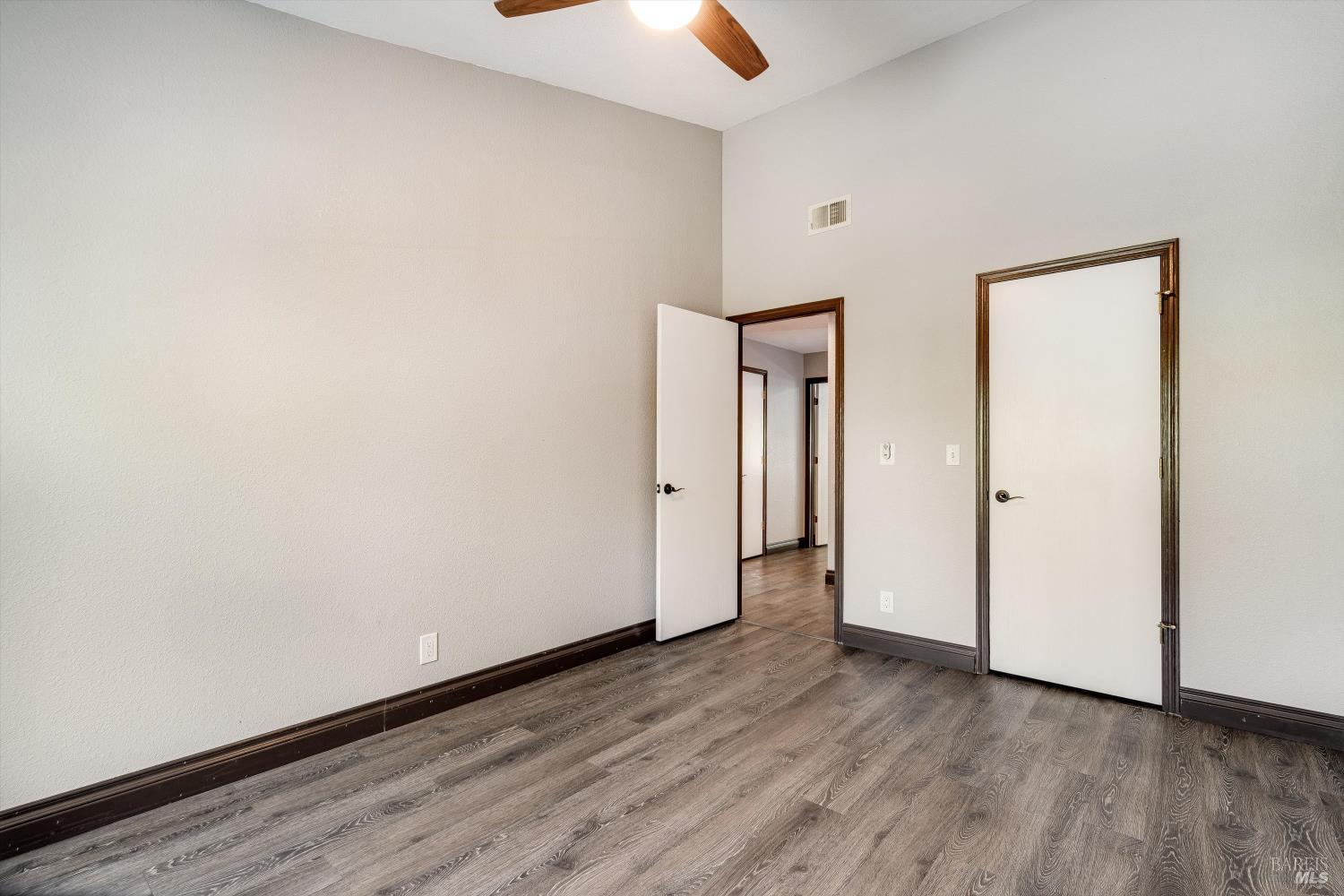 187 Wikiup Meadows Drive Santa Rosa, CA 95403 - Photo 31 of 66 a view of a hallway with wooden floor