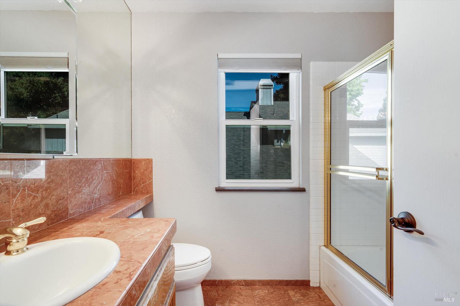 187 Wikiup Meadows Drive Santa Rosa, CA 95403 - Photo 36 of 66 a bathroom with a sink toilet and shower