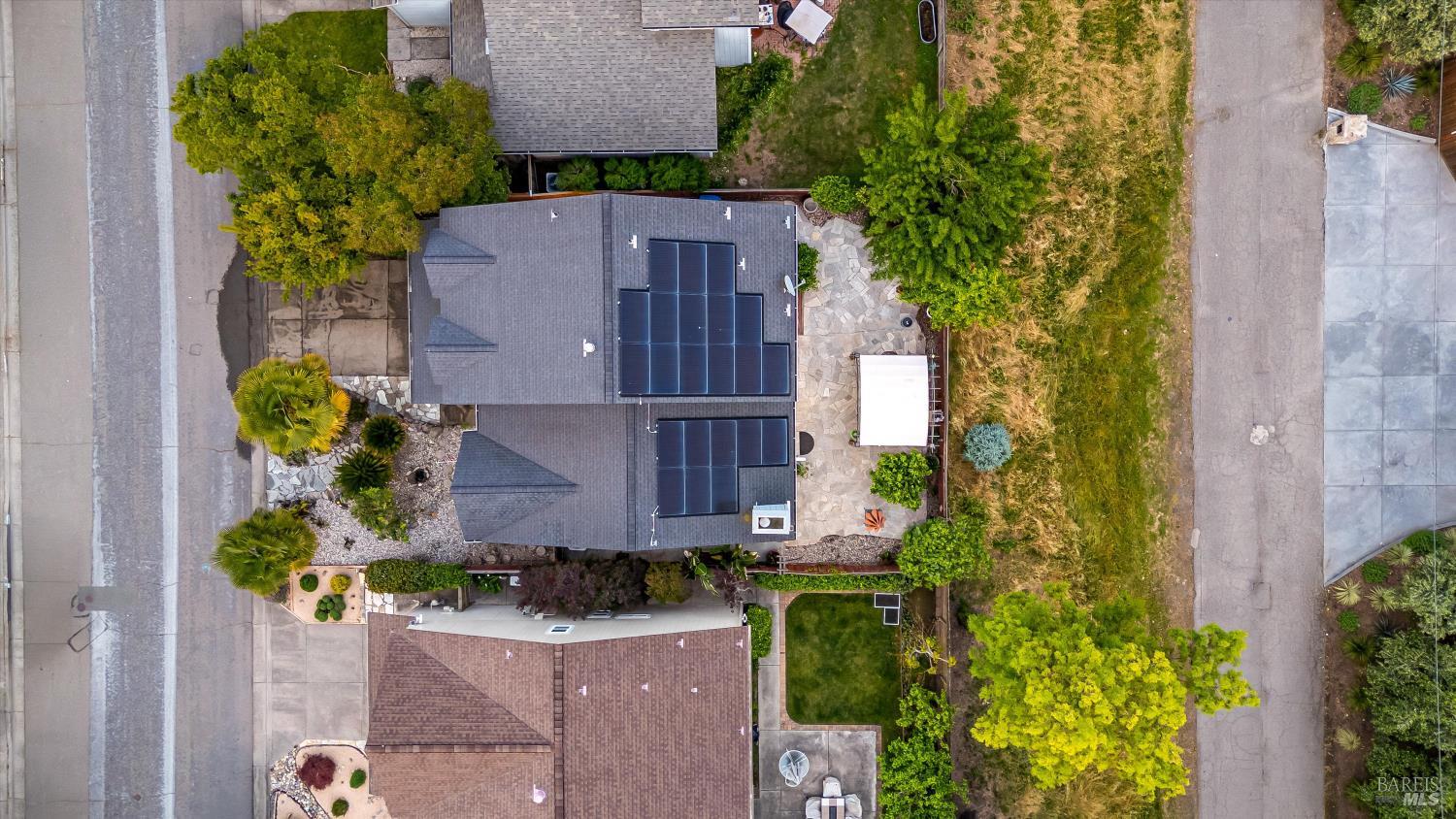 187 Wikiup Meadows Drive Santa Rosa, CA 95403 - Photo 64 of 66 an aerial view of a house with a yard and garden in back