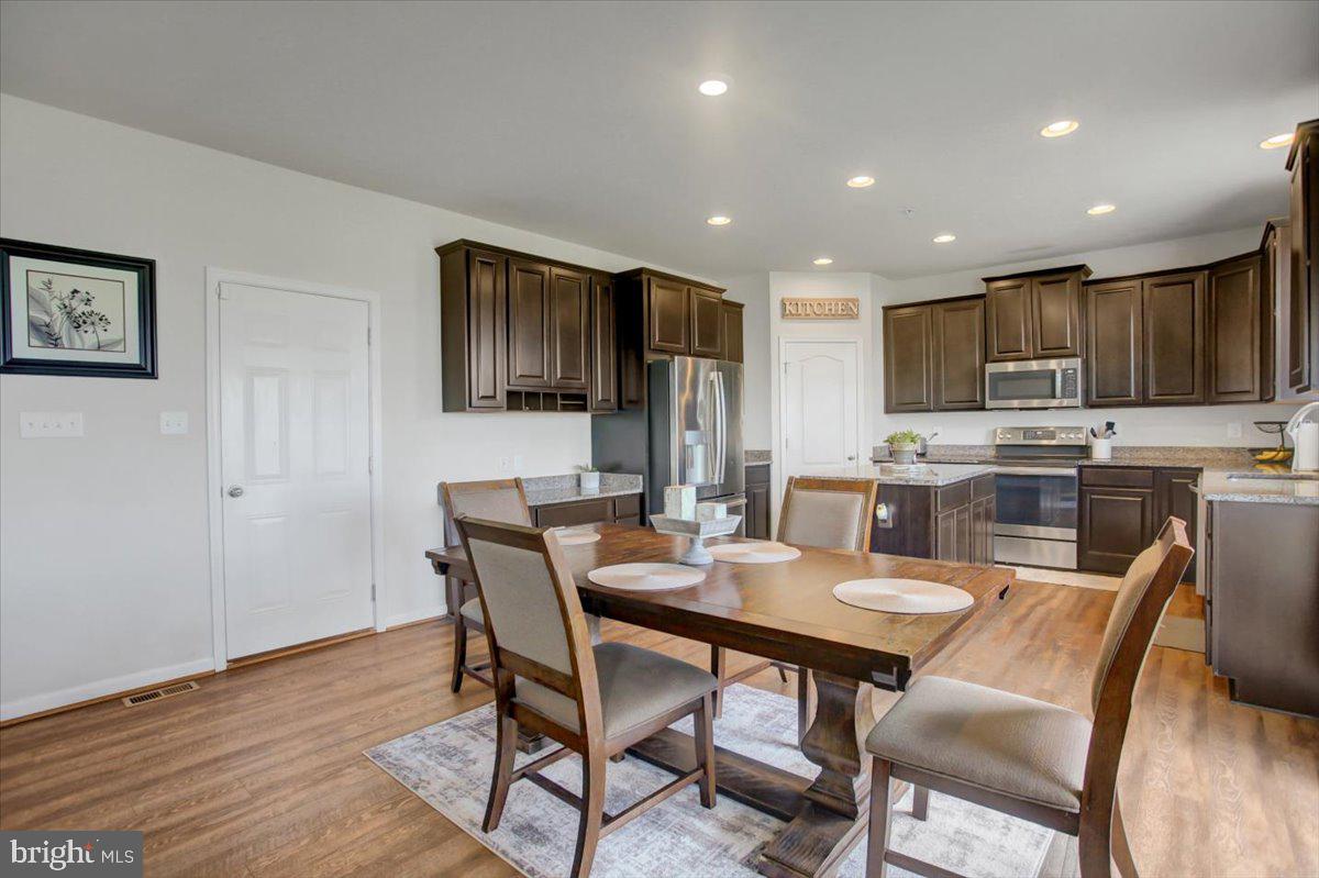 9822 Ripple Drive Williamsport, MD 21795 - Photo 11 of 41 a dining room with furniture and window
