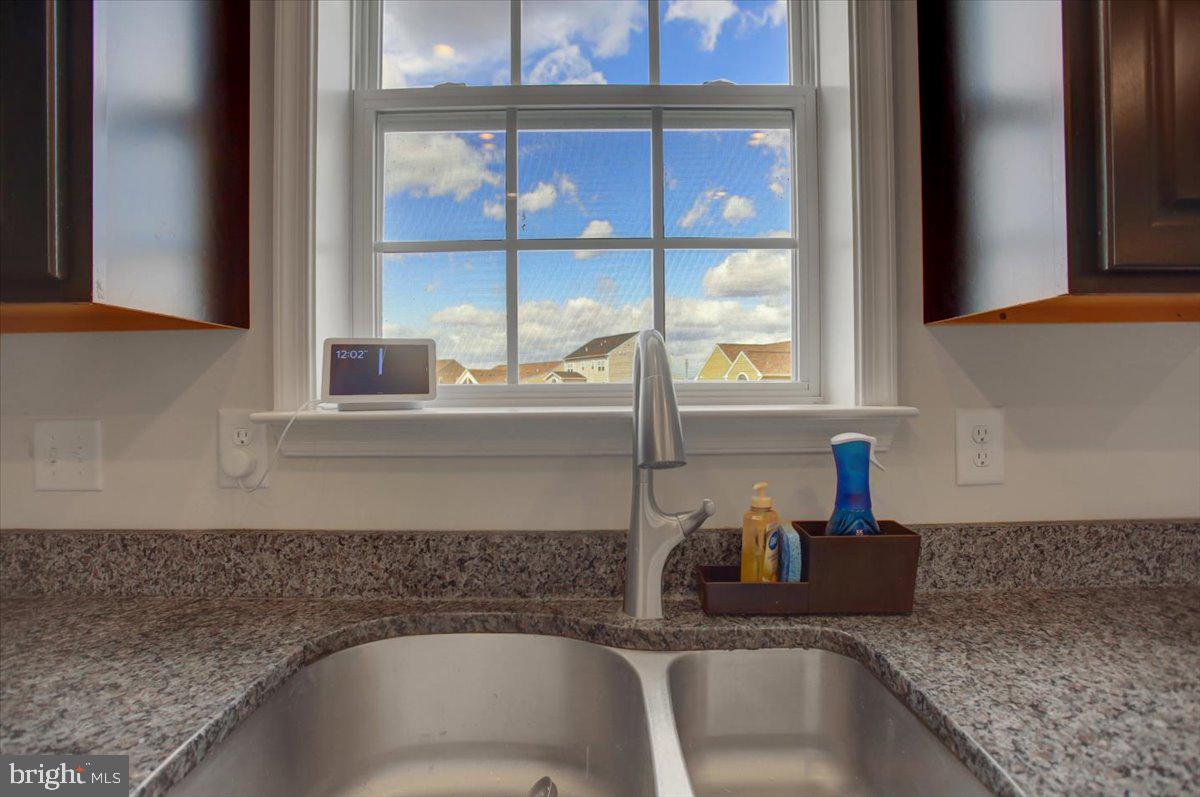 9822 Ripple Drive Williamsport, MD 21795 - Photo 14 of 41 a kitchen with granite countertop a sink and a window