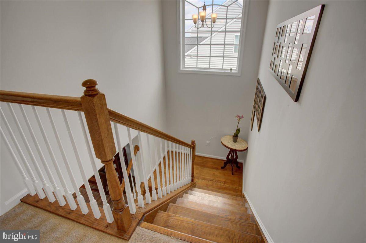 9822 Ripple Drive Williamsport, MD 21795 - Photo 15 of 41 a view of a hallway with windows