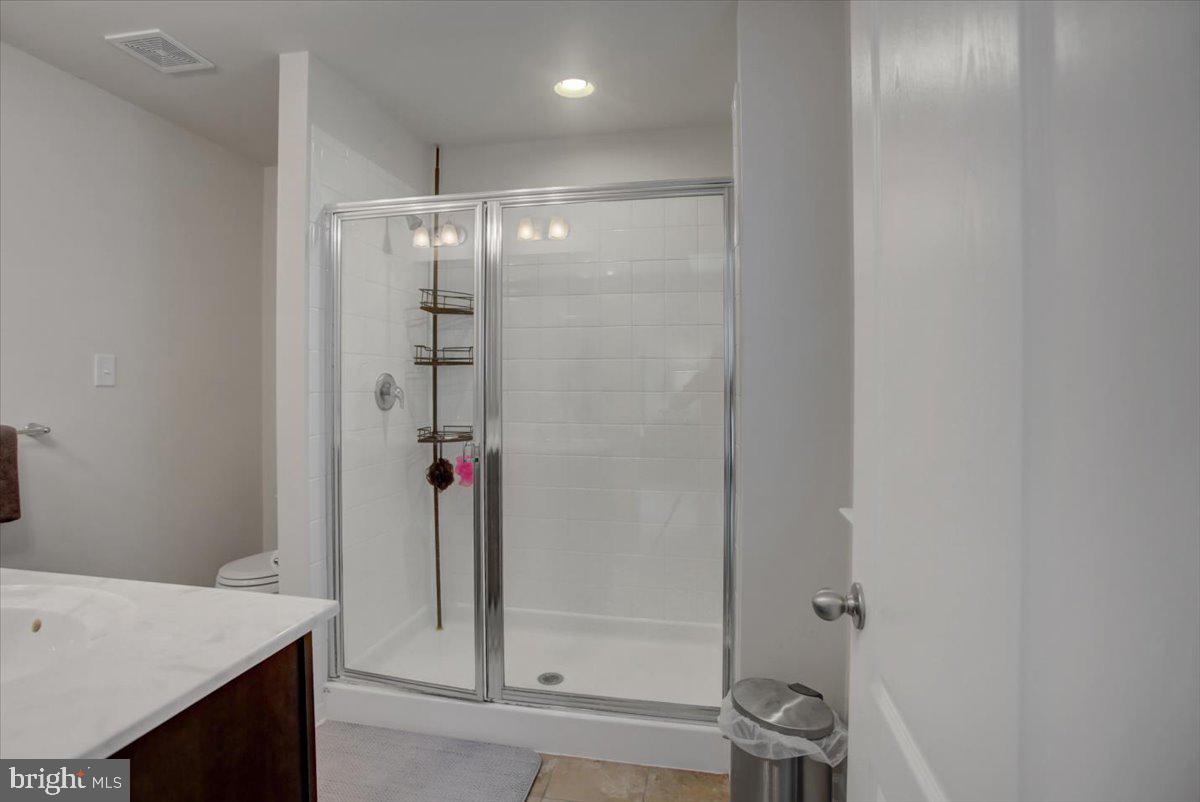 9822 Ripple Drive Williamsport, MD 21795 - Photo 20 of 41 a bathroom with a shower and a sink