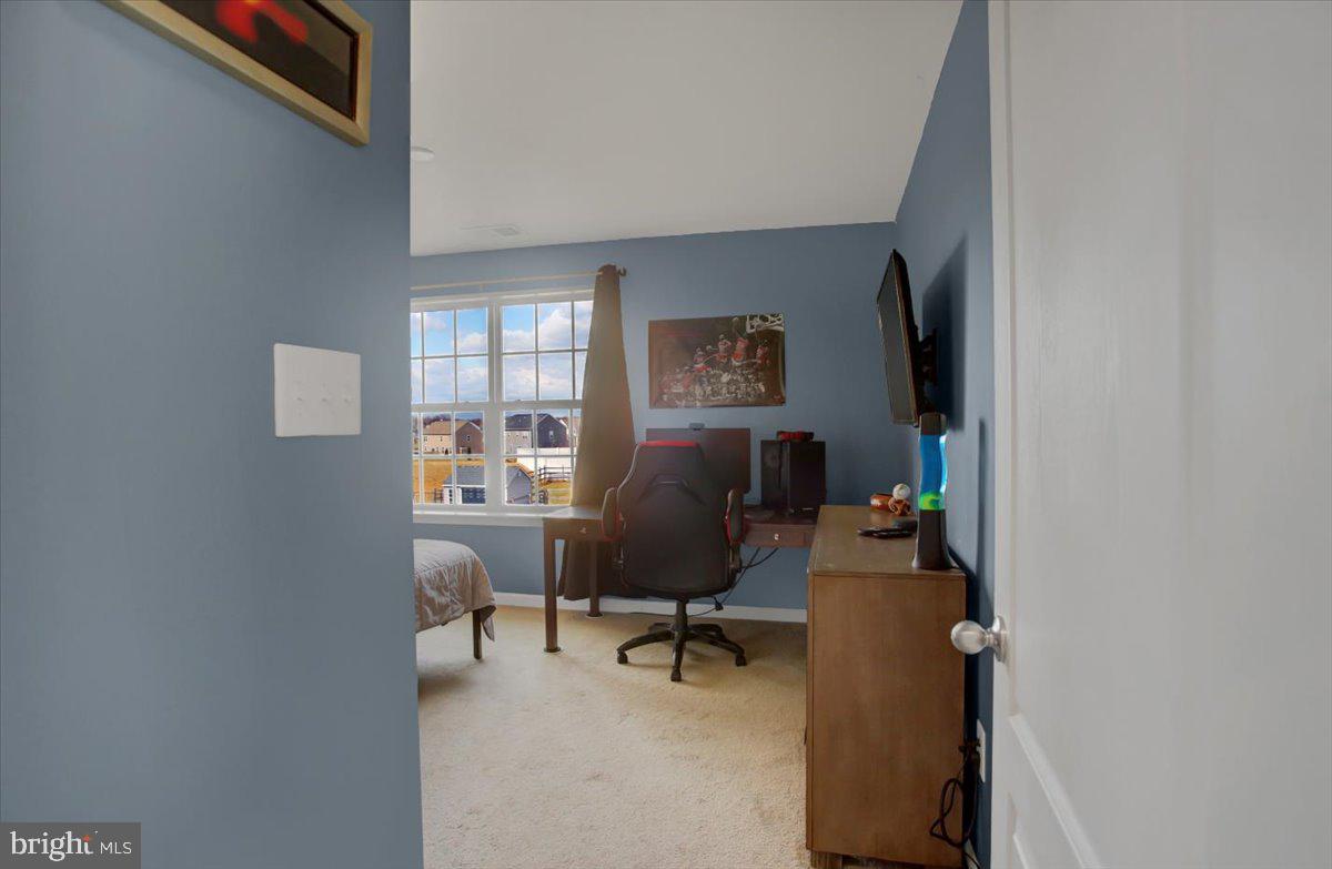 9822 Ripple Drive Williamsport, MD 21795 - Photo 30 of 41 a view of a workspace with furniture and a window
