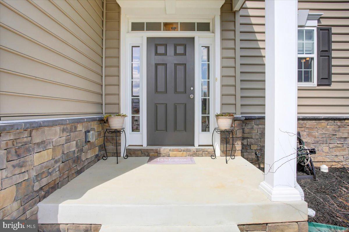 9822 Ripple Drive Williamsport, MD 21795 - Photo 3 of 41 a white building with a outdoor space