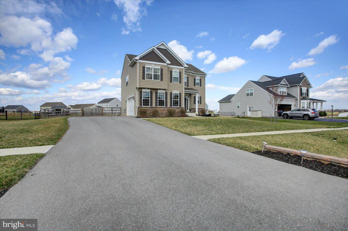 9822 Ripple Drive Williamsport, MD 21795 - Photo 36 of 41 a view of a house with a big yard and large trees