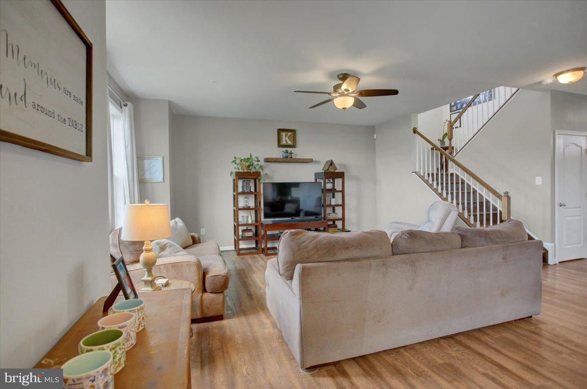 9822 Ripple Drive Williamsport, MD 21795 - Photo 9 of 41 a living room with furniture and a fireplace