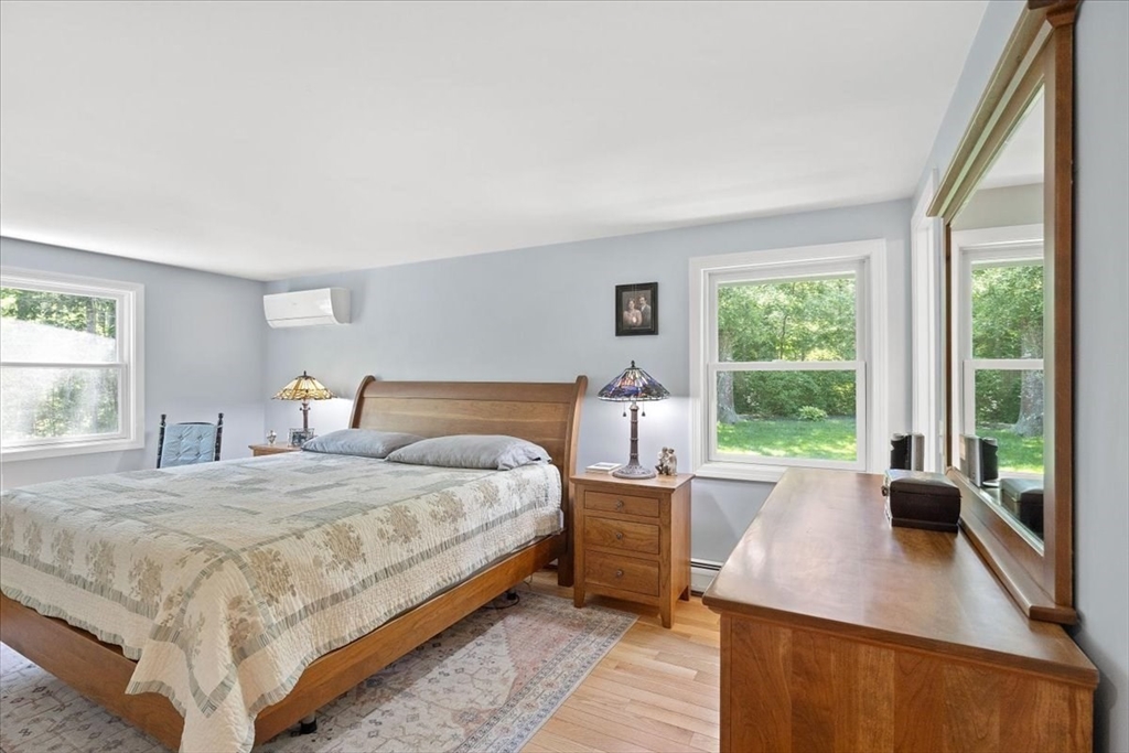7 Brook Street Plympton, MA 02367 - Photo 13 of 42 a bedroom with a bed and a large window