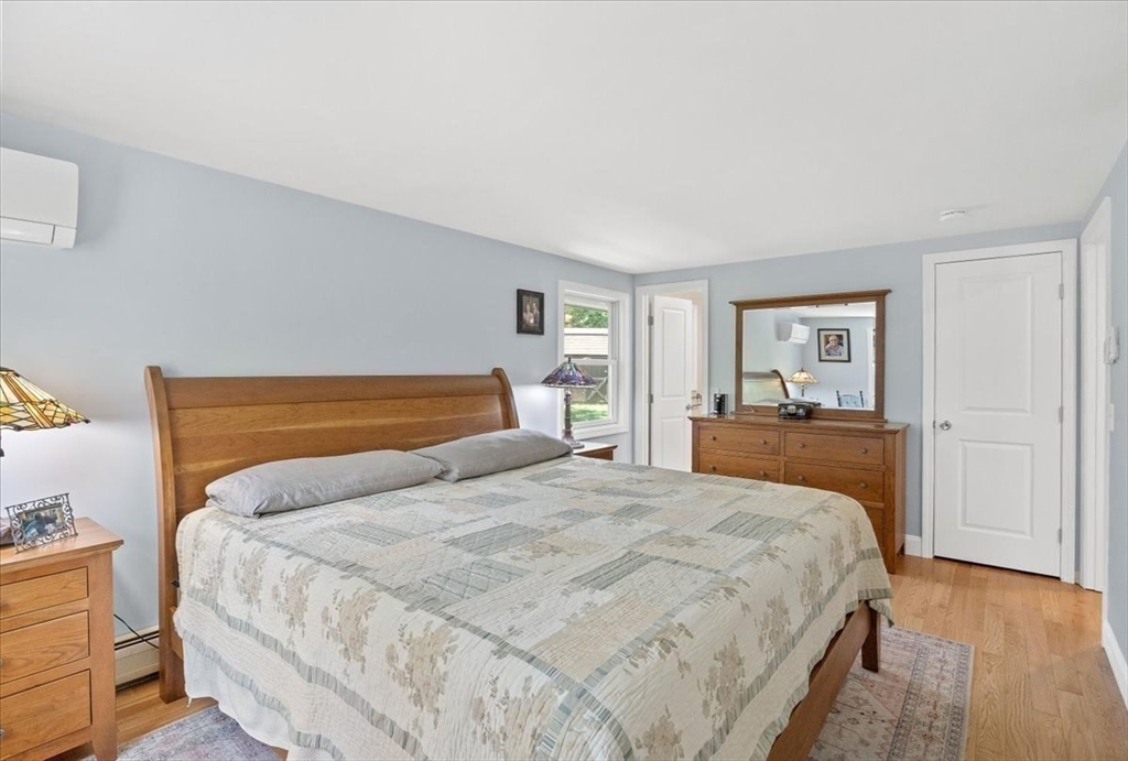 7 Brook Street Plympton, MA 02367 - Photo 14 of 42 a bedroom with a large bed and a closet