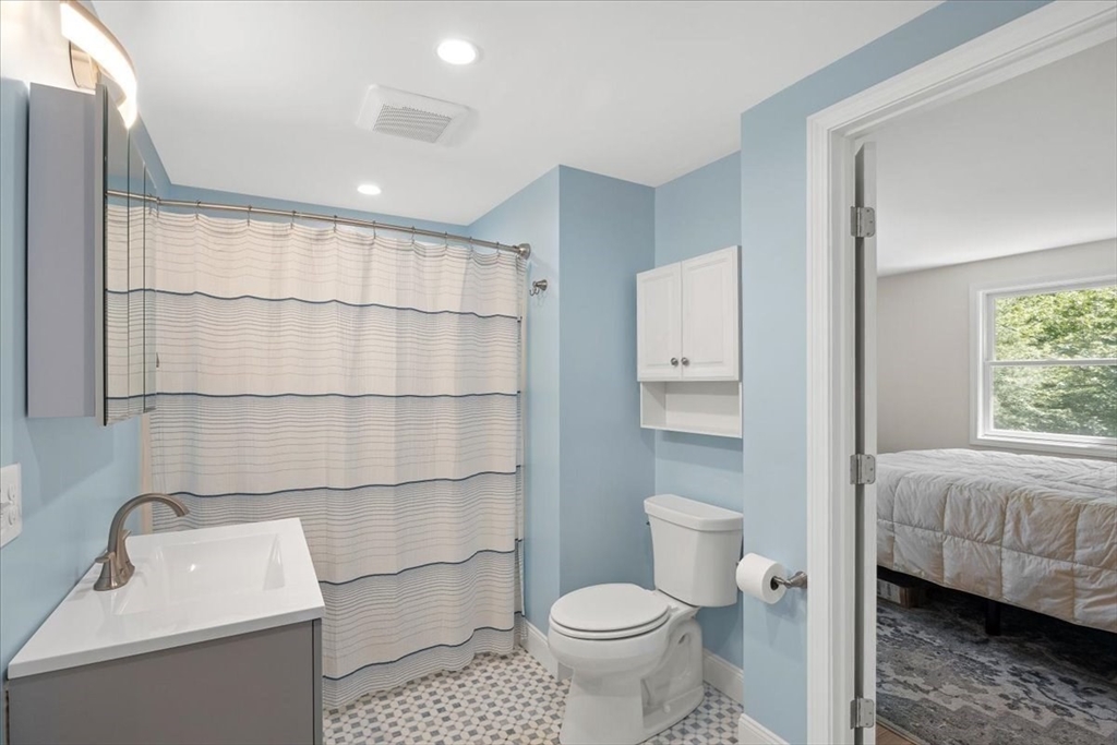 7 Brook Street Plympton, MA 02367 - Photo 20 of 42 a bathroom with a toilet a sink and shower