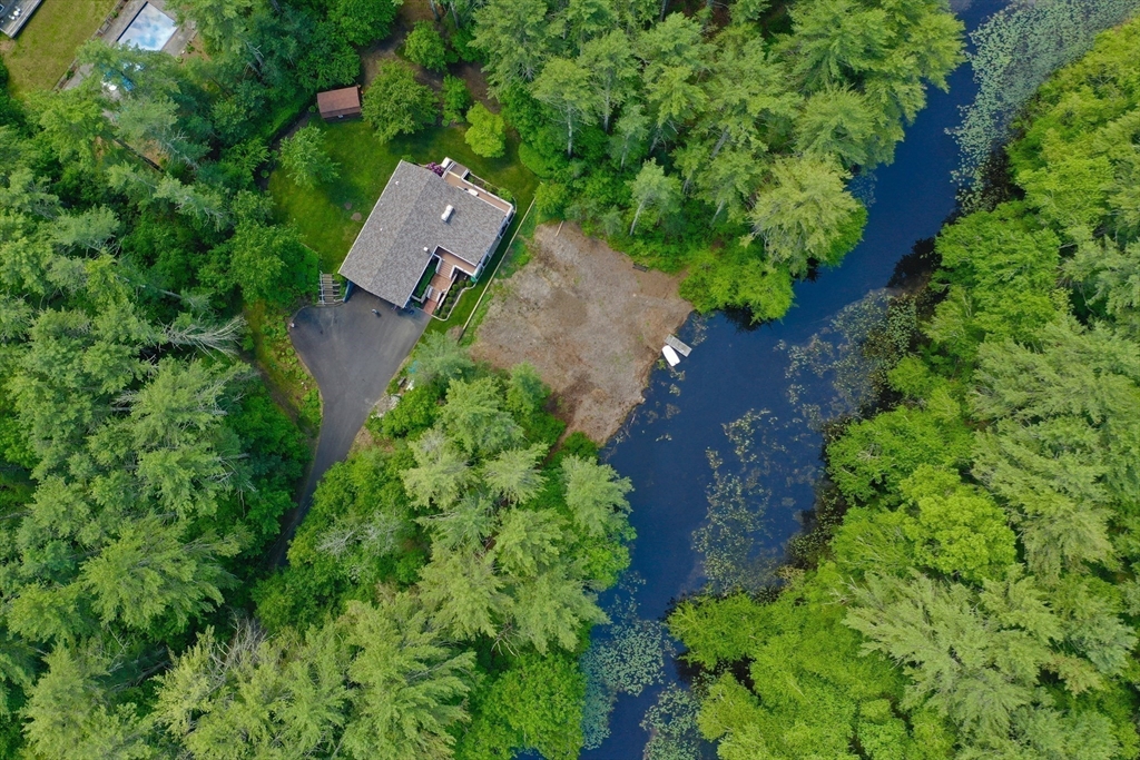 7 Brook Street Plympton, MA 02367 - Photo 2 of 42 an aerial view of a house with a yard and garden