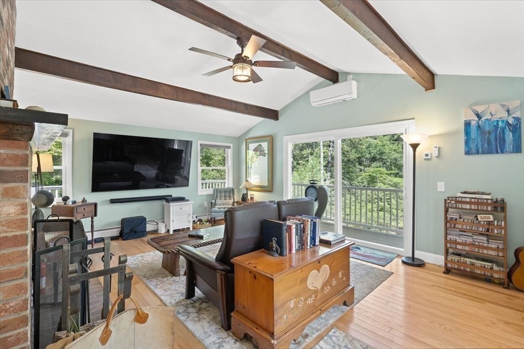 7 Brook Street Plympton, MA 02367 - Photo 5 of 42 a living room with furniture and a flat screen tv