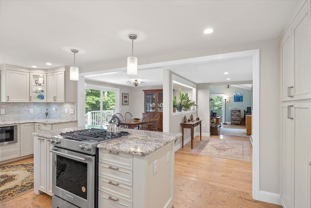 7 Brook Street Plympton, MA 02367 - Photo 9 of 42 a kitchen with stainless steel appliances granite countertop a stove and a sink