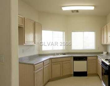 5935 Crumbling Ridge Street Henderson, NV 89011 - Photo 3 of 8 Kitchen.