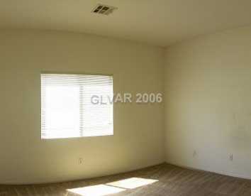 5935 Crumbling Ridge Street Henderson, NV 89011 - Photo 5 of 8 Master Bedroom.