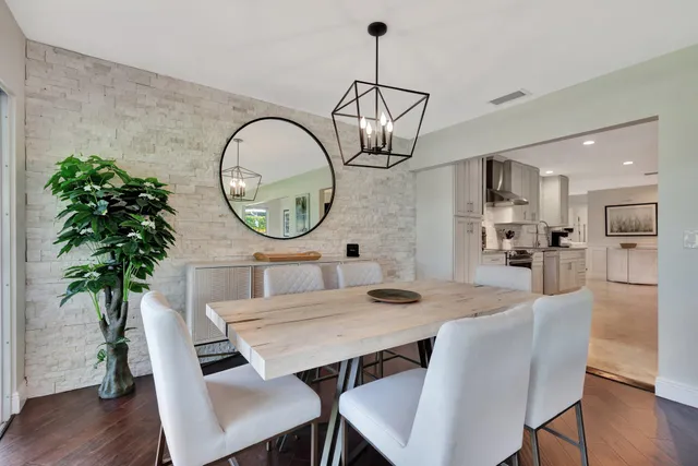 a view of a workspace with furniture