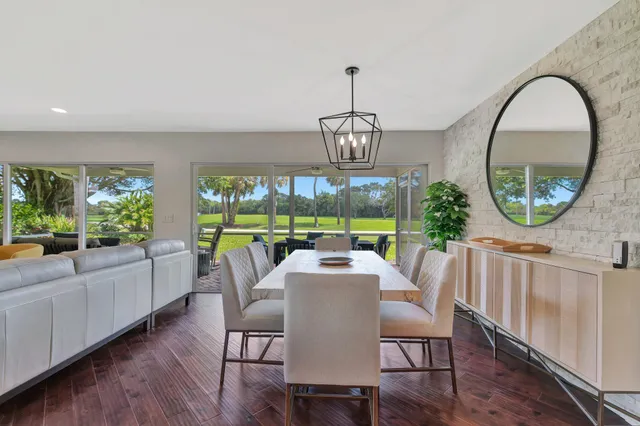 a kitchen with stainless steel appliances and white cabinets