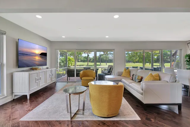 an aerial view of a houses with outdoor space and street view