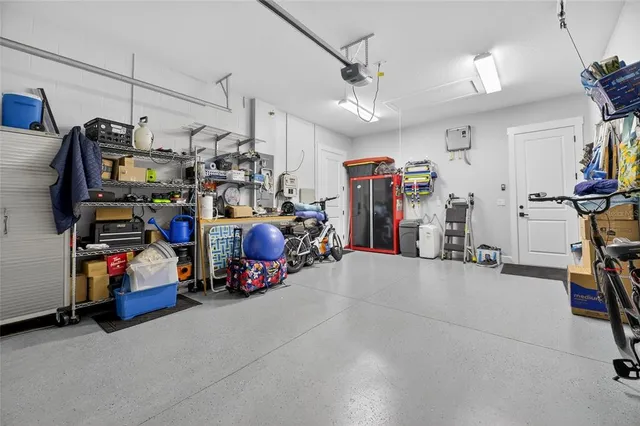 an aerial view of a house with outdoor space
