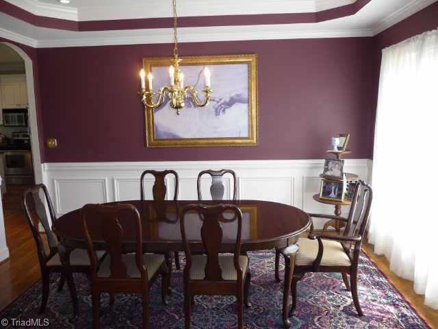 4460 Cotswold Road Pfafftown, NC 27040 - Photo 5 of 9 Other. Dining room has tray ceiling, box molding, crown molding and hardwood floors. Laundry room off kitchen with ceramic tile and coat closet.